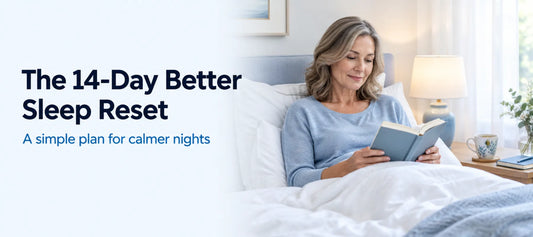 Blog header: The 14-Day Better Sleep Reset, with a woman in her fifties reading in bed beside a softly lit bedside table