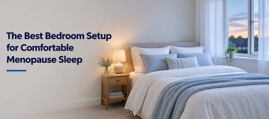 A calm, softly lit bedroom with light layered bedding, a bedside lamp and a glass of water, set up for comfortable sleep