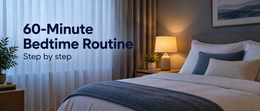 Serene bedroom with a dim lamp and drawn curtains, with the text 60-Minute Bedtime Routine